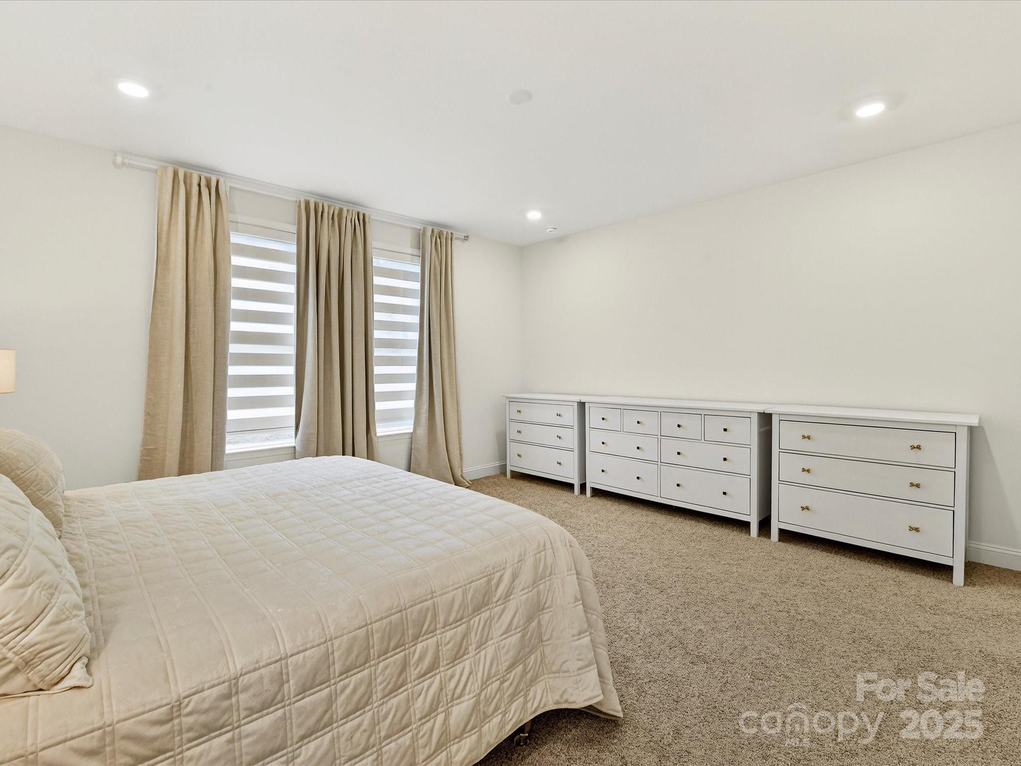 4790 Formation Court Lancaster, SC 29720 - Photo 23 of 41 a spacious bedroom with a bed and a window