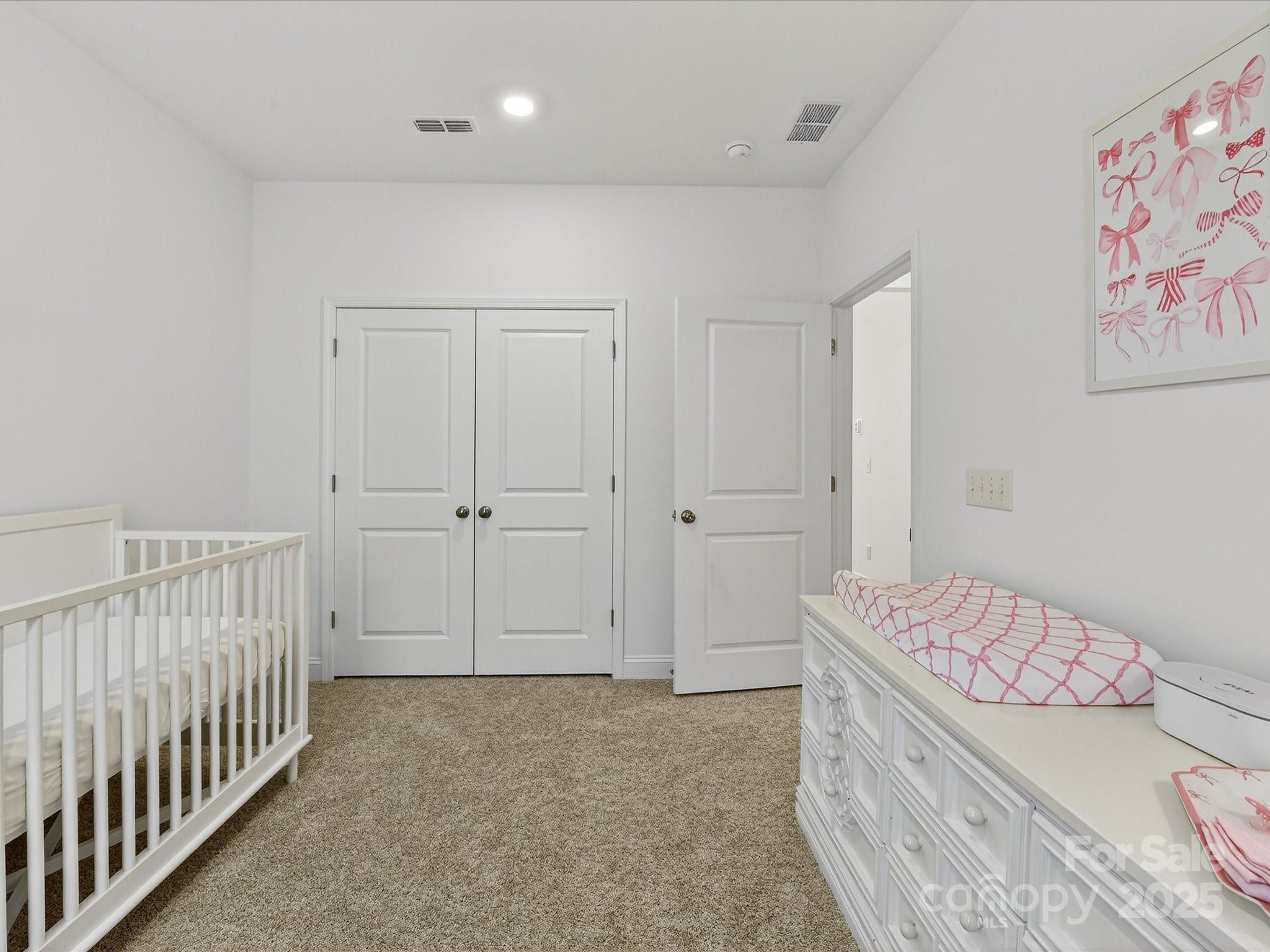 4790 Formation Court Lancaster, SC 29720 - Photo 26 of 41 a bedroom with a bed and a walk in closet