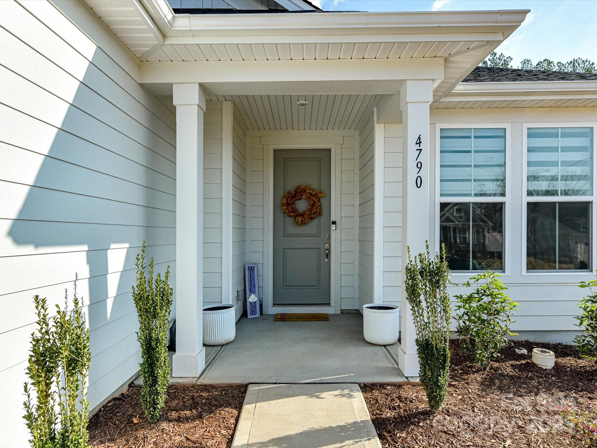 4790 Formation Court Lancaster, SC 29720 - Photo 3 of 41 a view of a house with potted plants