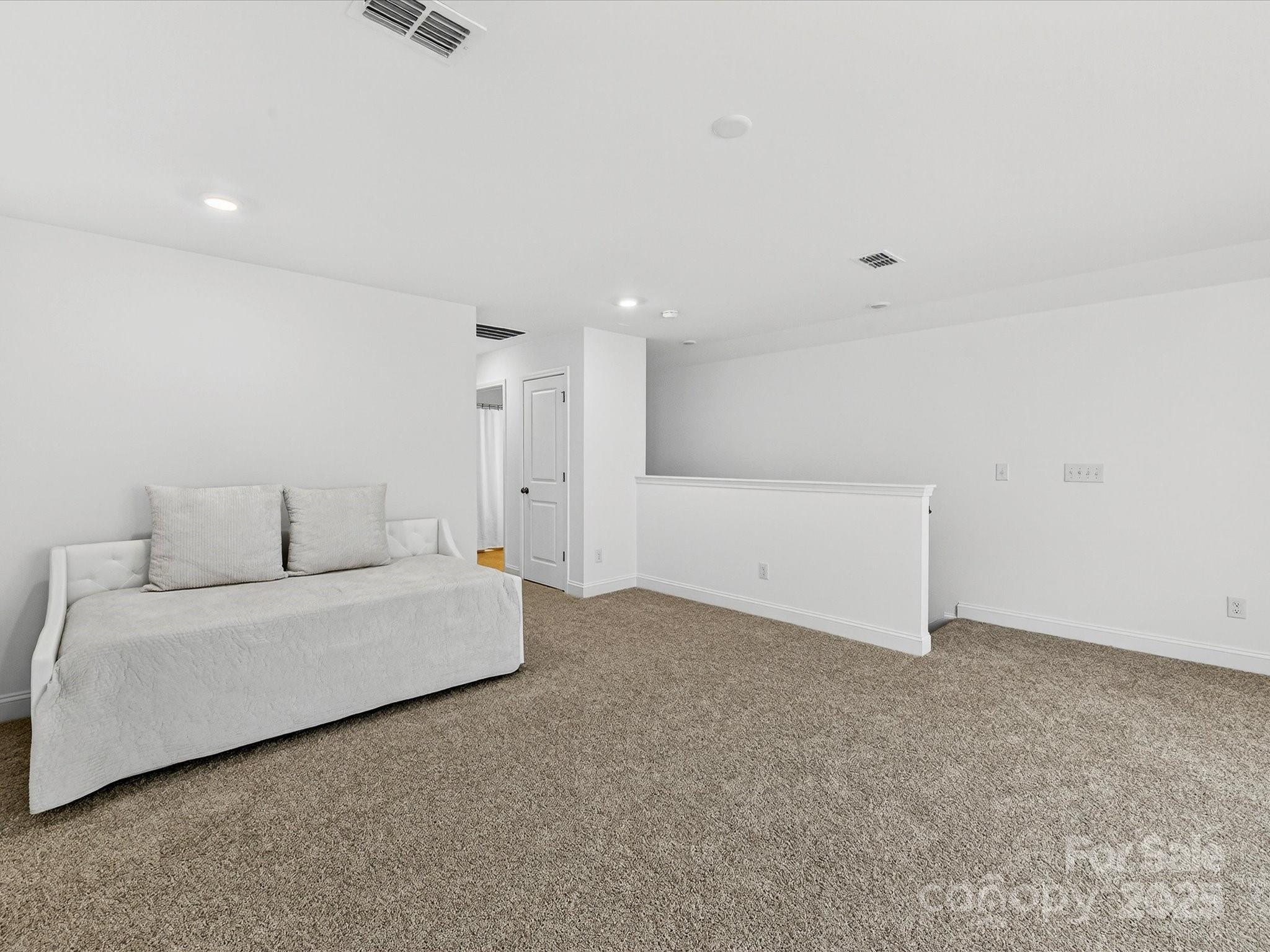 4790 Formation Court Lancaster, SC 29720 - Photo 32 of 41 a living room with furniture and a wall painting