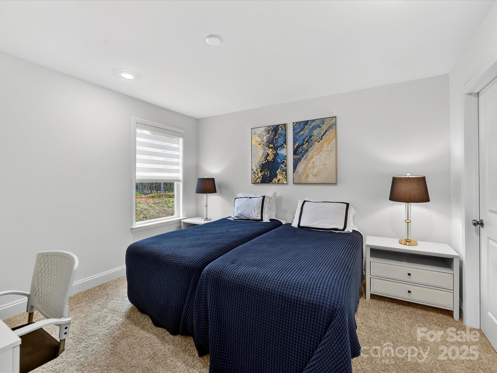4790 Formation Court Lancaster, SC 29720 - Photo 33 of 41 a bedroom with a bed and a chair