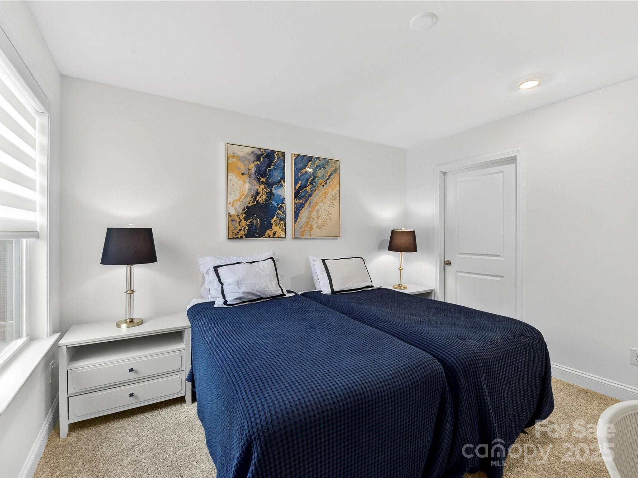 4790 Formation Court Lancaster, SC 29720 - Photo 34 of 41 a bedroom with a bed and a night stand