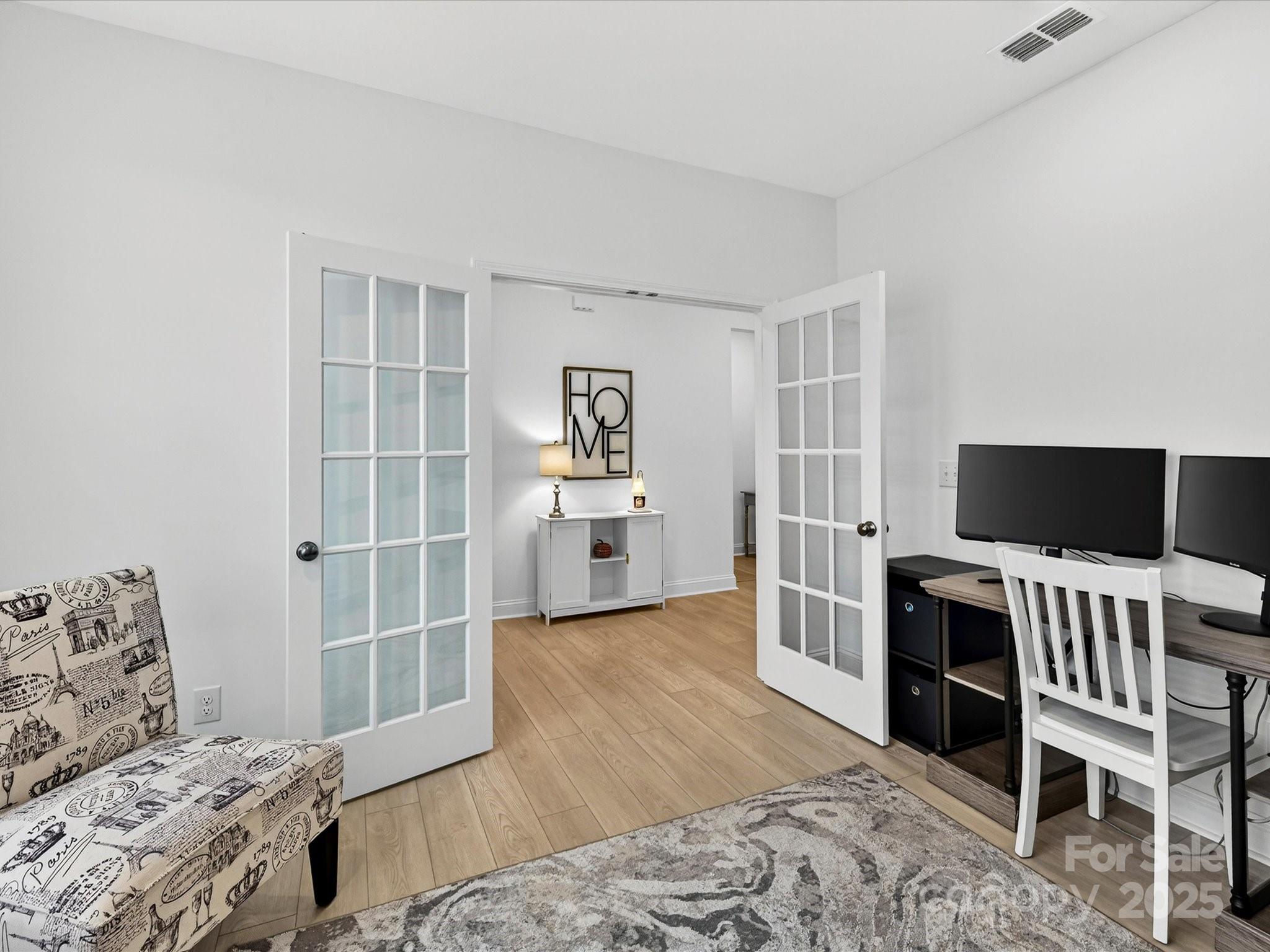 4790 Formation Court Lancaster, SC 29720 - Photo 5 of 41 a bedroom with a bed and a chair