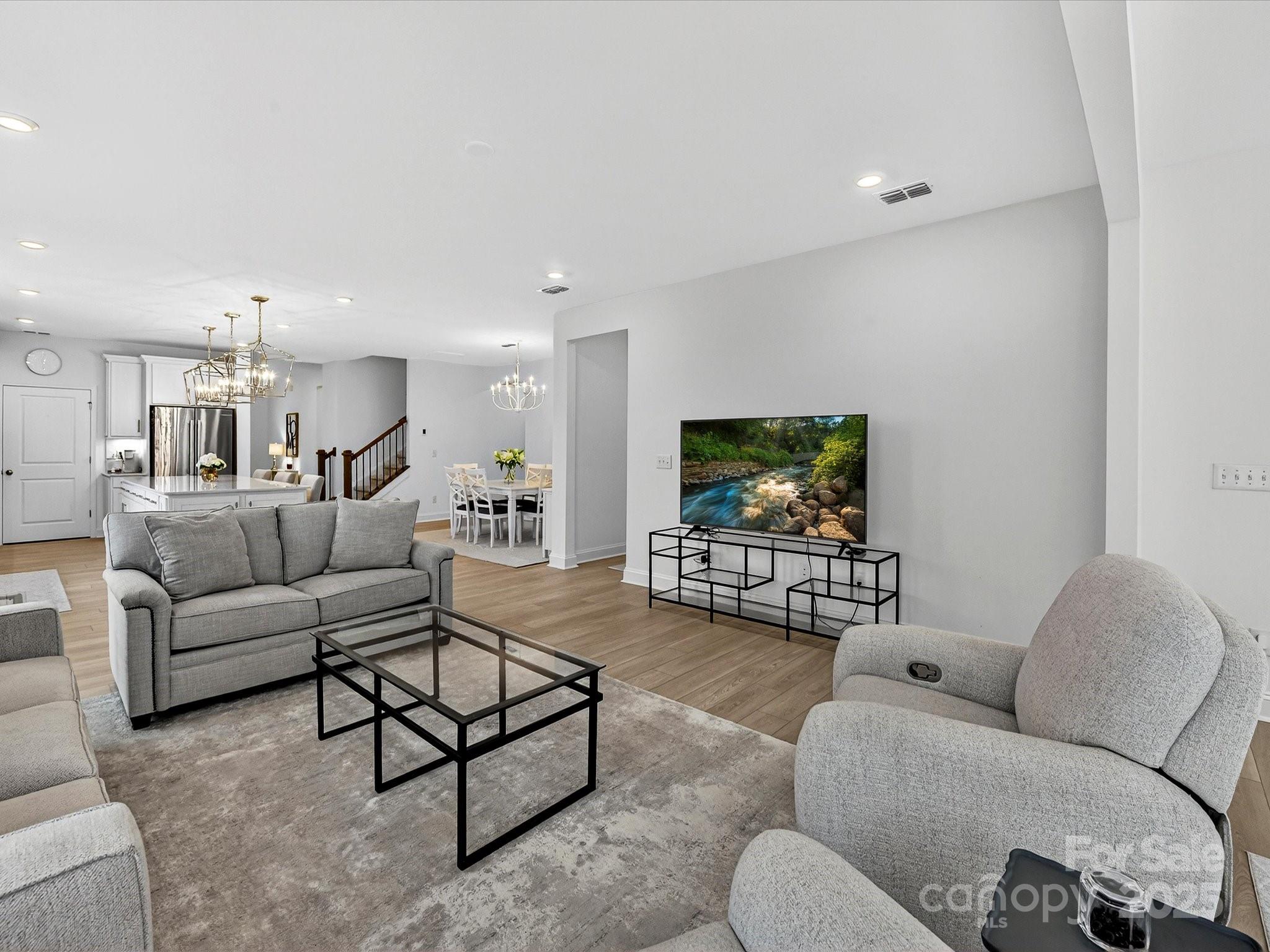 4790 Formation Court Lancaster, SC 29720 - Photo 9 of 41 a living room with furniture and a flat screen tv