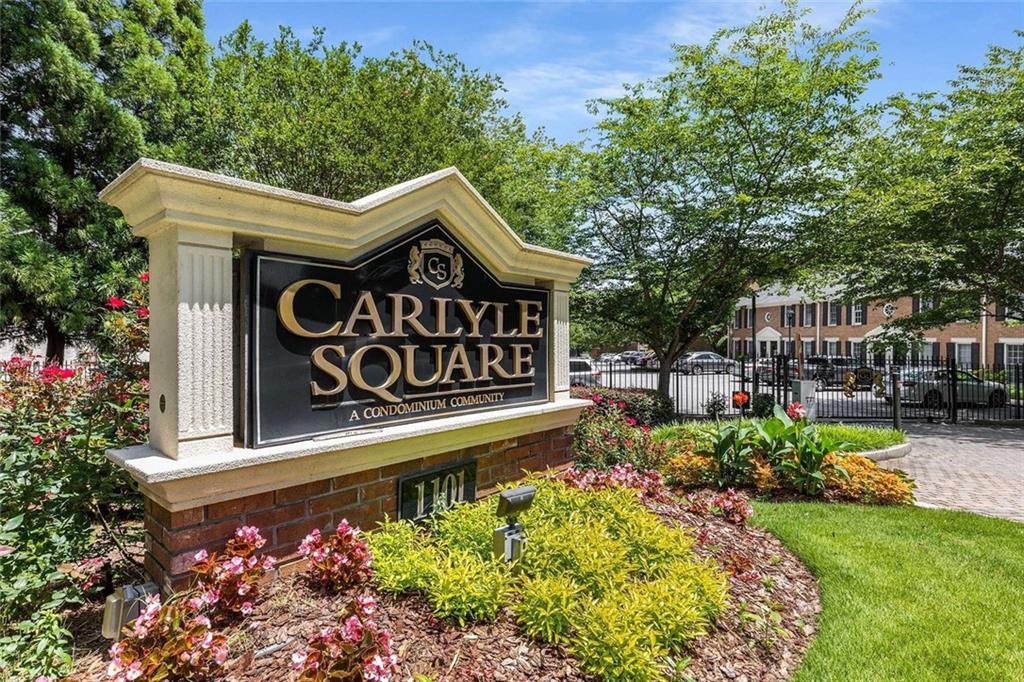 1101 Collier Road Northwest, Unit P2 Atlanta, GA 30318 - Photo 2 of 26 a view of a sign board with yard