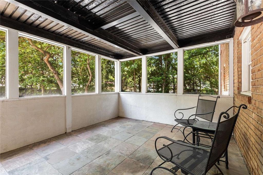1101 Collier Road Northwest, Unit P2 Atlanta, GA 30318 - Photo 24 of 26 a view of a room with furniture and windows