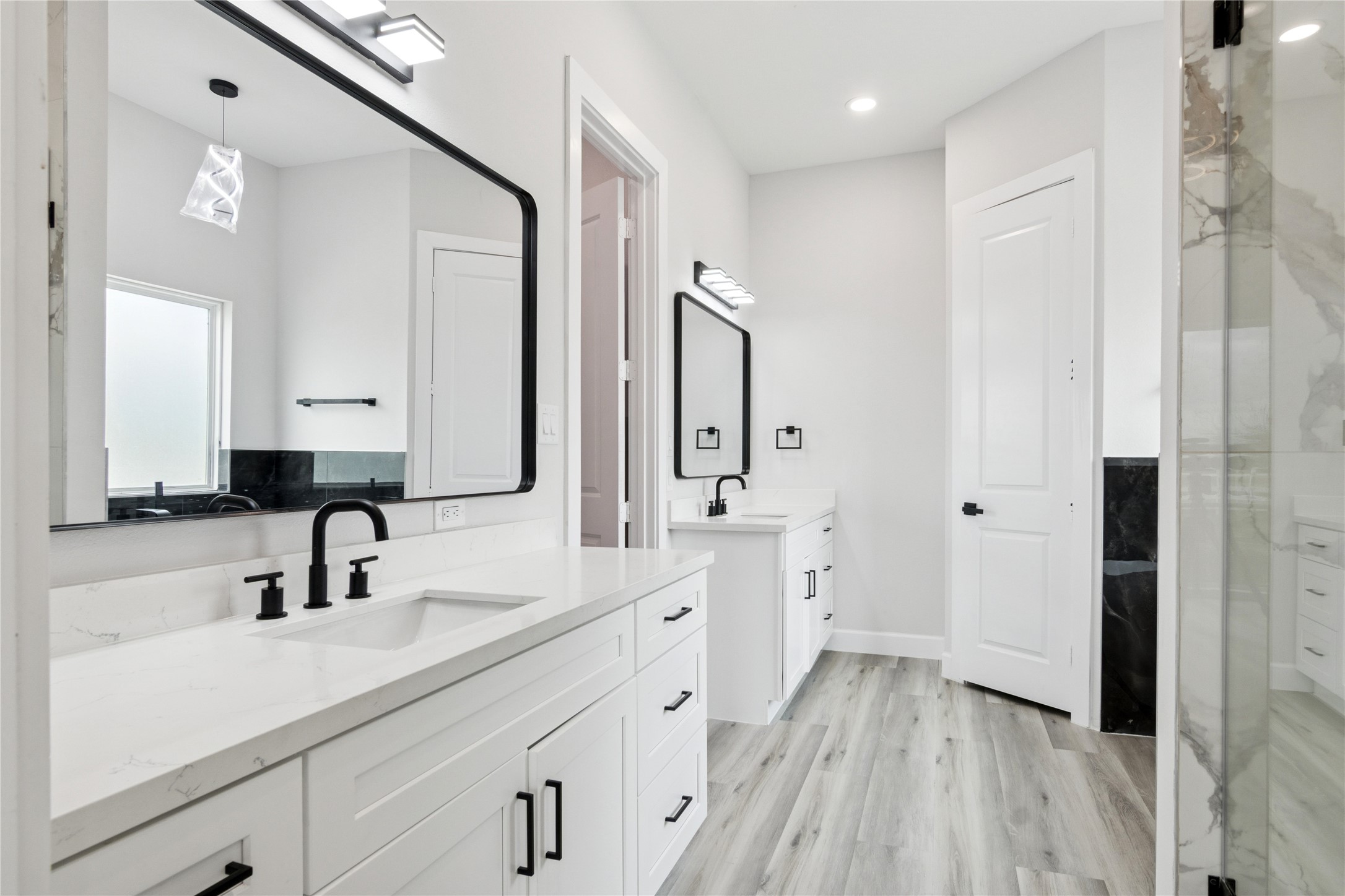 5766 Ward Bend Road Sealy, TX 77474 - Photo 30 of 45 a bathroom with a double vanity sink mirror and shower