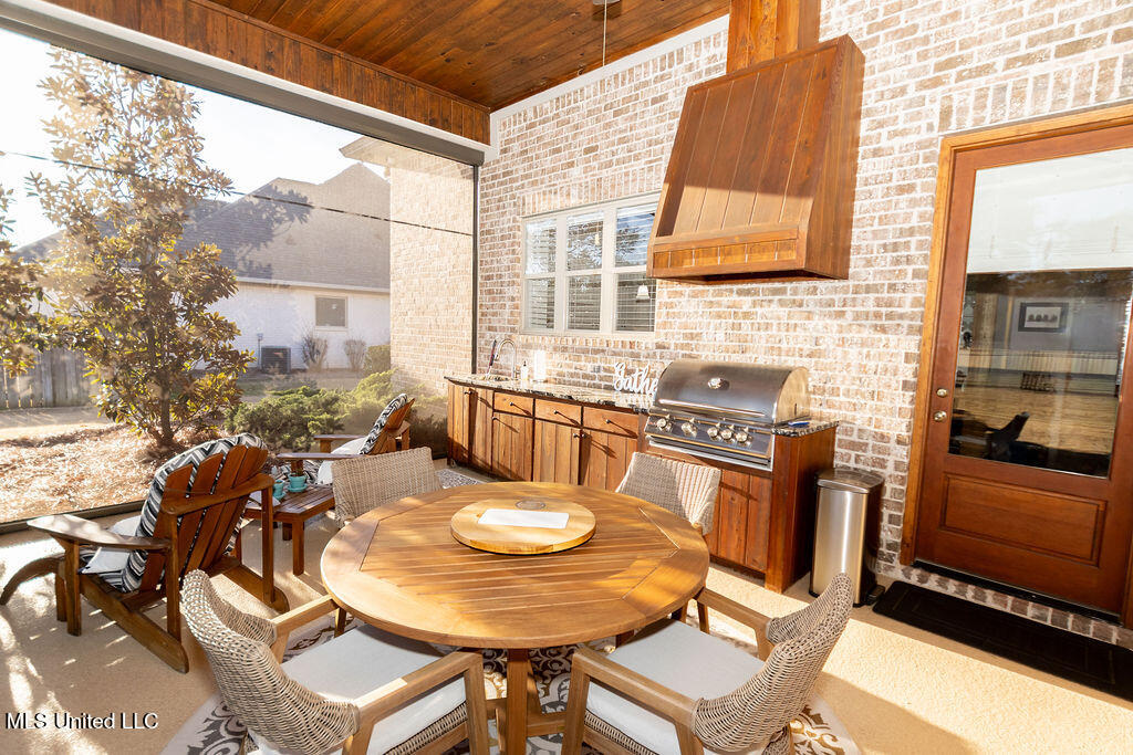 367 Caroline Boulevard Madison, MS 39110 - Photo 40 of 61 Back Covered Patio With Fireplace & Outd
