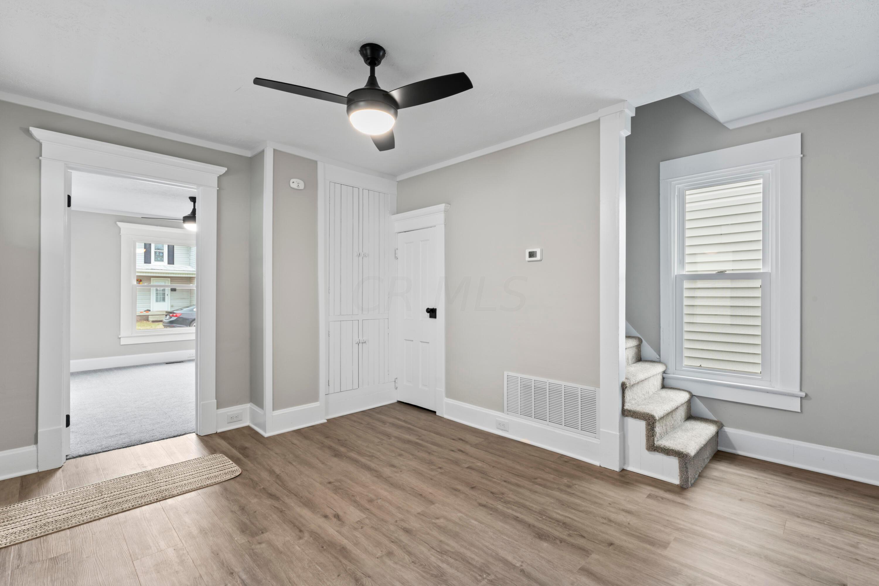 90 Roe Avenue Newark, OH 43055 - Photo 13 of 32 Living Room to Bedroom and Steps