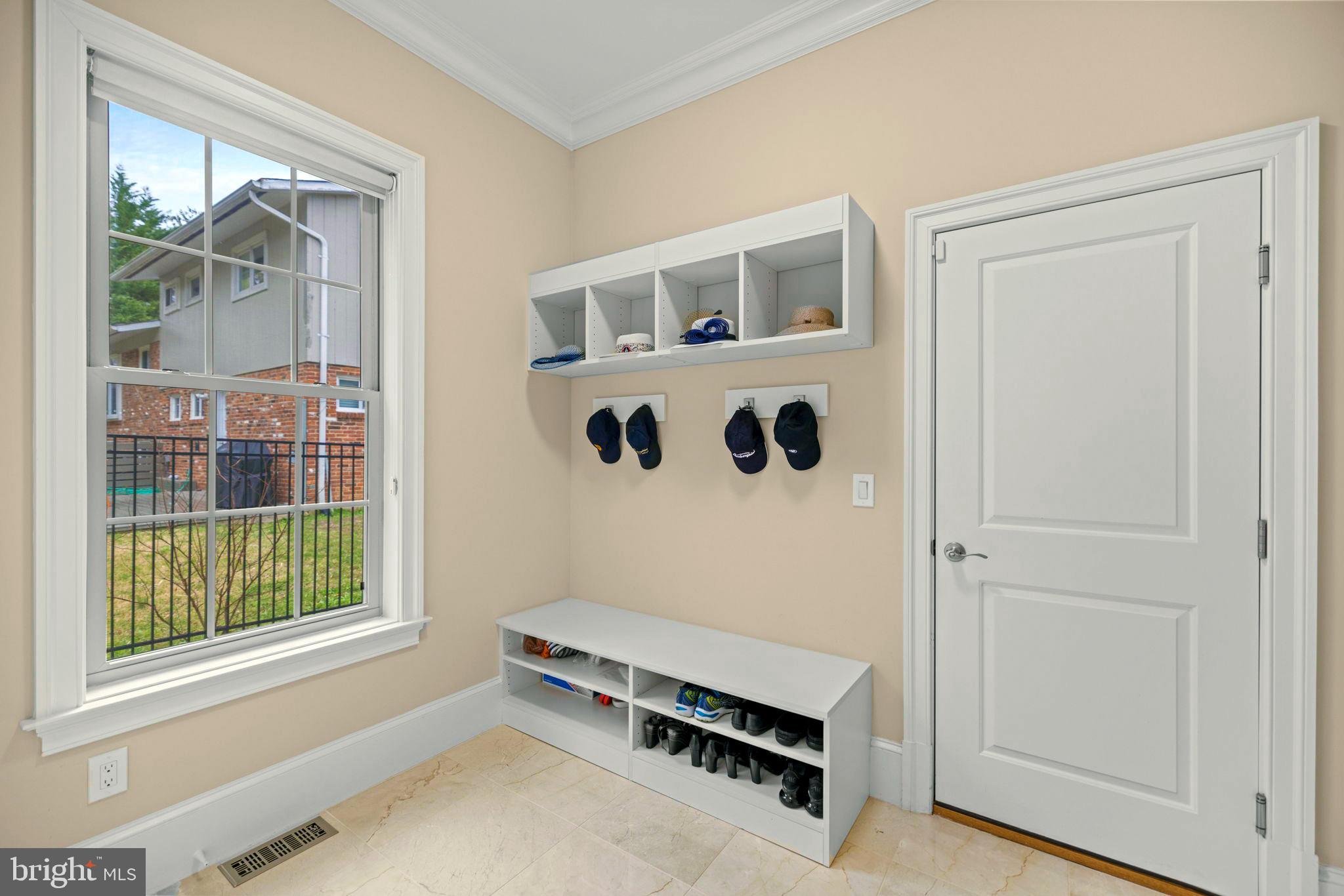 7708 Beech Tree Road Bethesda, MD 20817 - Photo 20 of 55 a view of a livingroom with furniture and windows