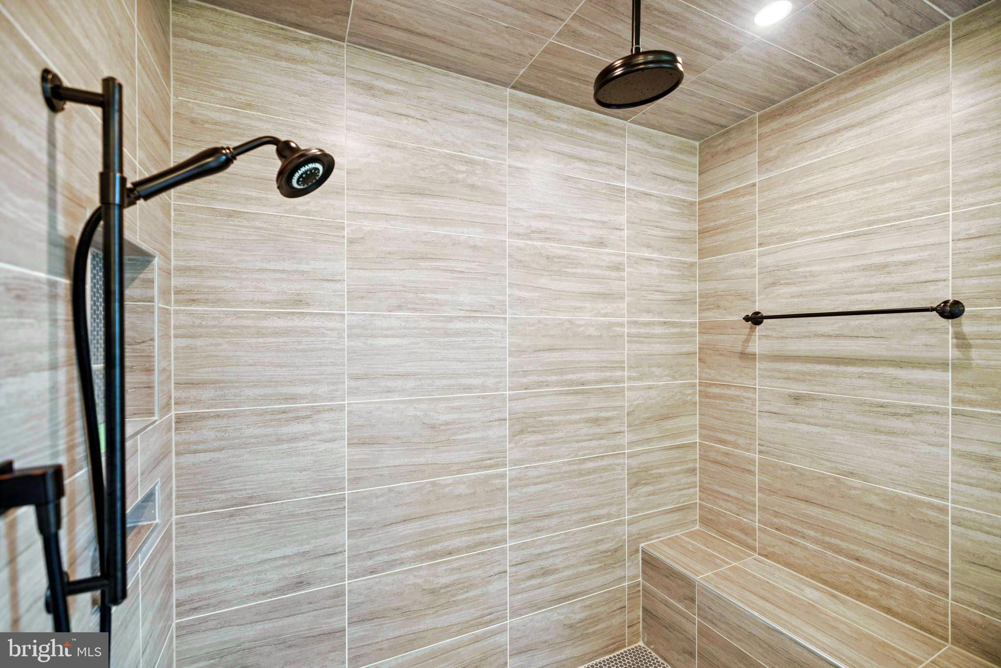 7708 Beech Tree Road Bethesda, MD 20817 - Photo 27 of 55 a bathroom with a shower