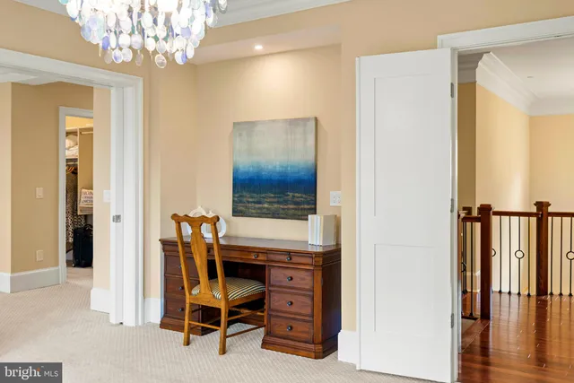 a spacious bedroom with a large bed and a window