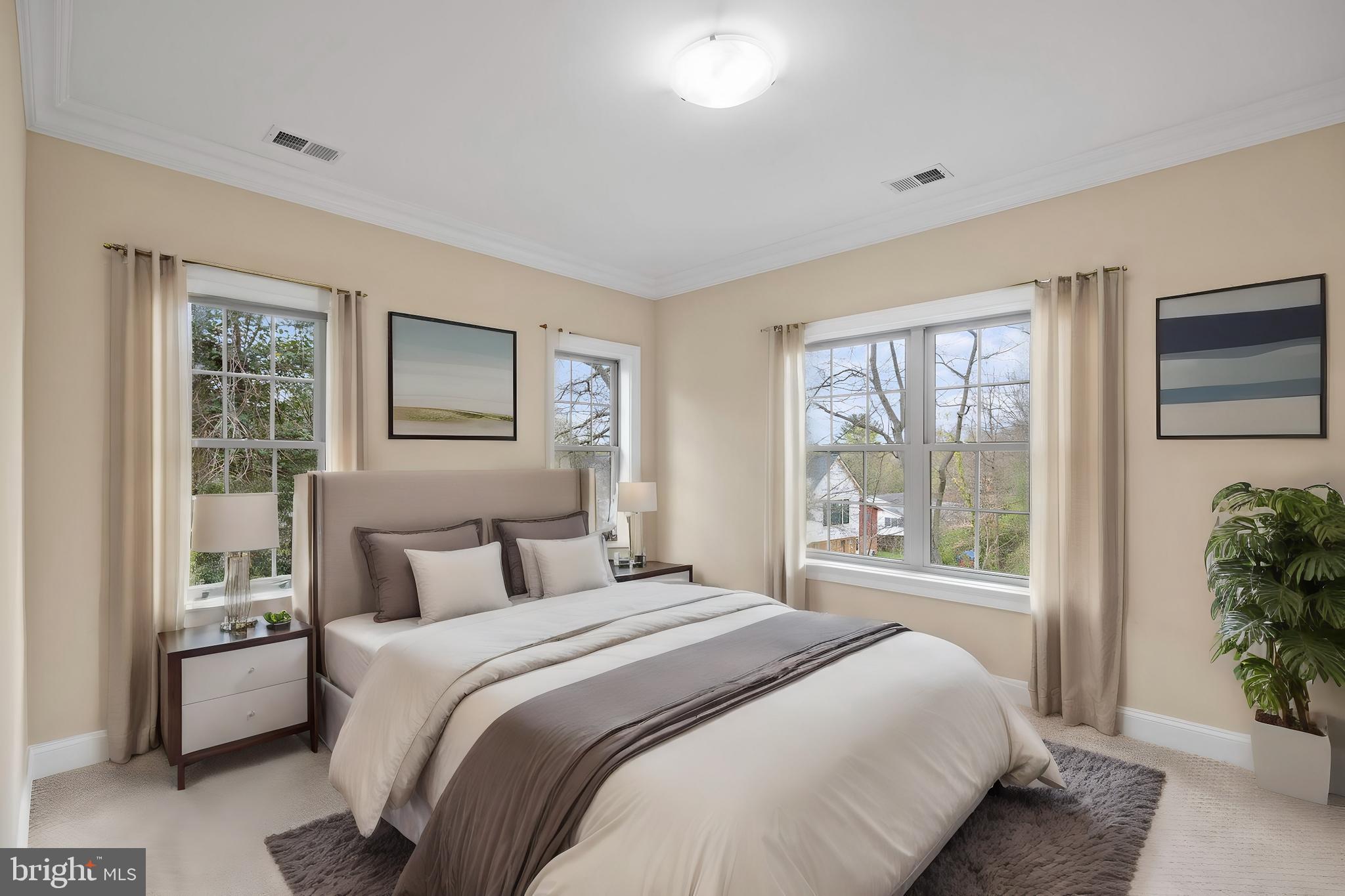 7708 Beech Tree Road Bethesda, MD 20817 - Photo 39 of 55 a bedroom with a large bed and a window