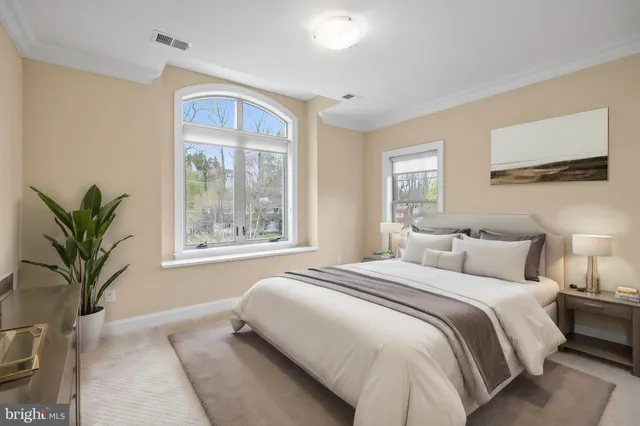 a bathroom with a granite countertop sink toilet and bathtub