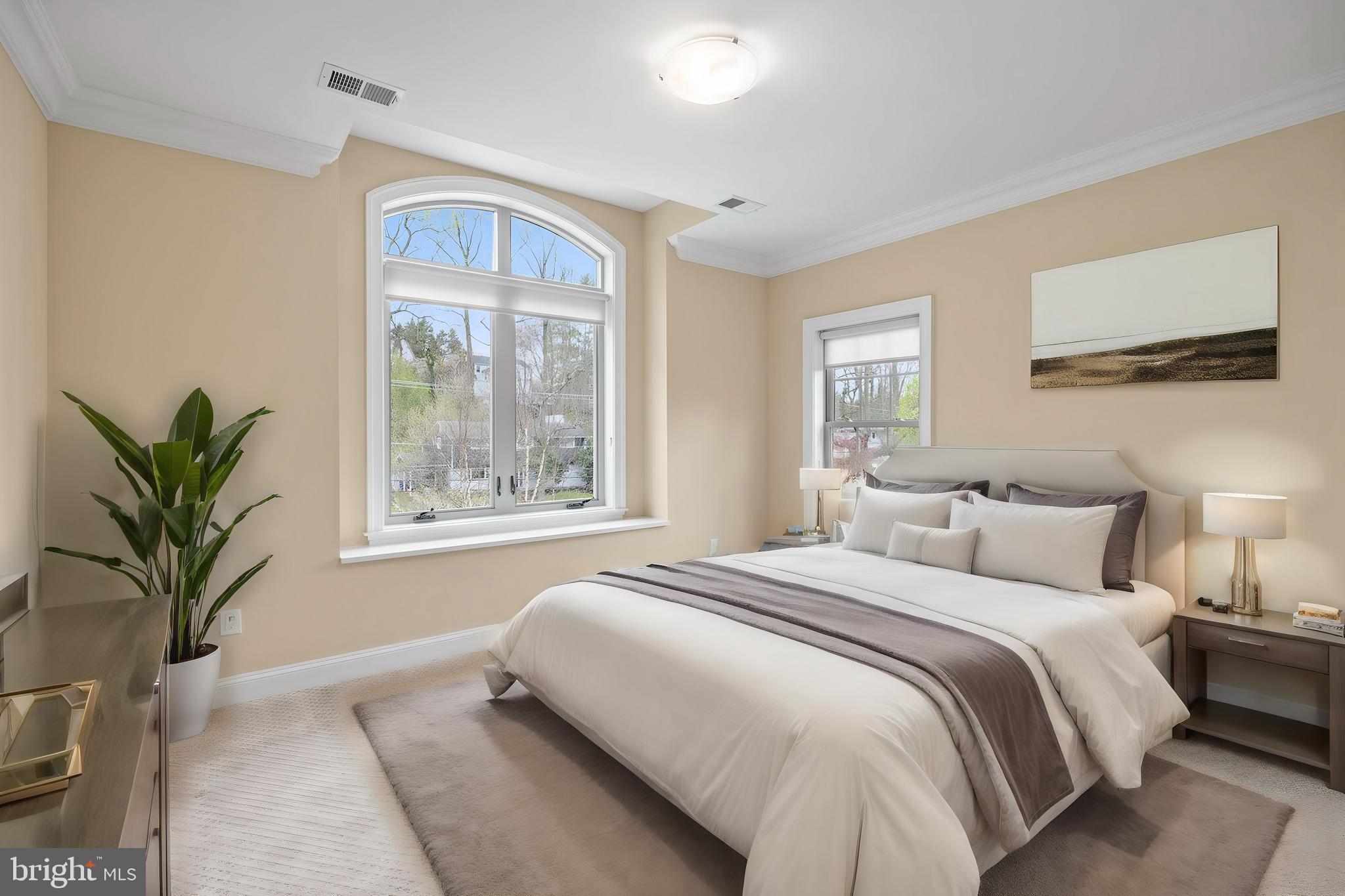 7708 Beech Tree Road Bethesda, MD 20817 - Photo 41 of 55 a bedroom with a large bed and a window