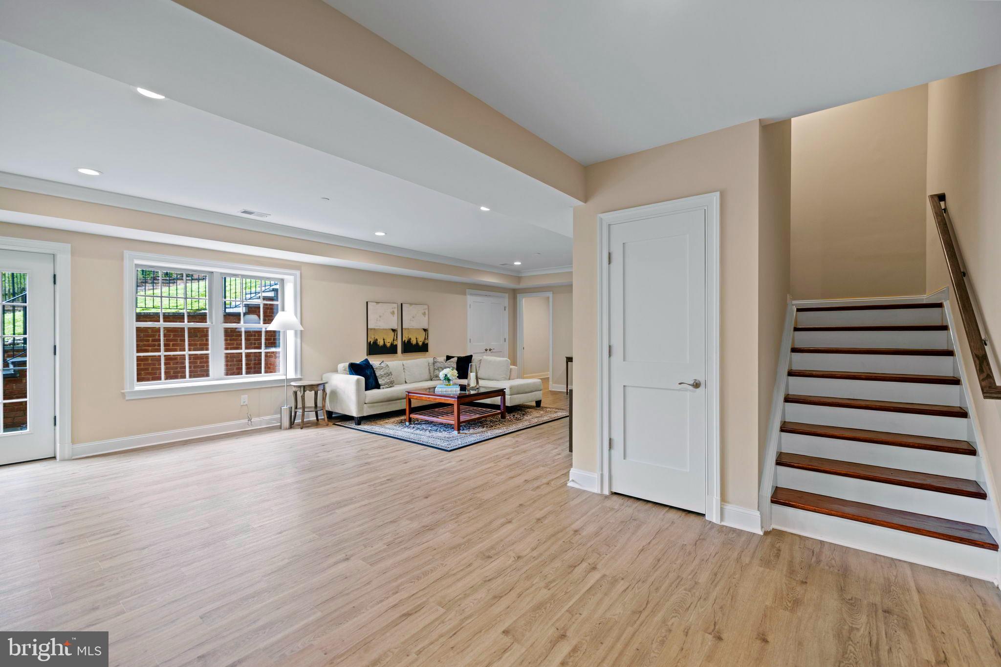 7708 Beech Tree Road Bethesda, MD 20817 - Photo 43 of 55 a view of a livingroom with furniture and wooden floor