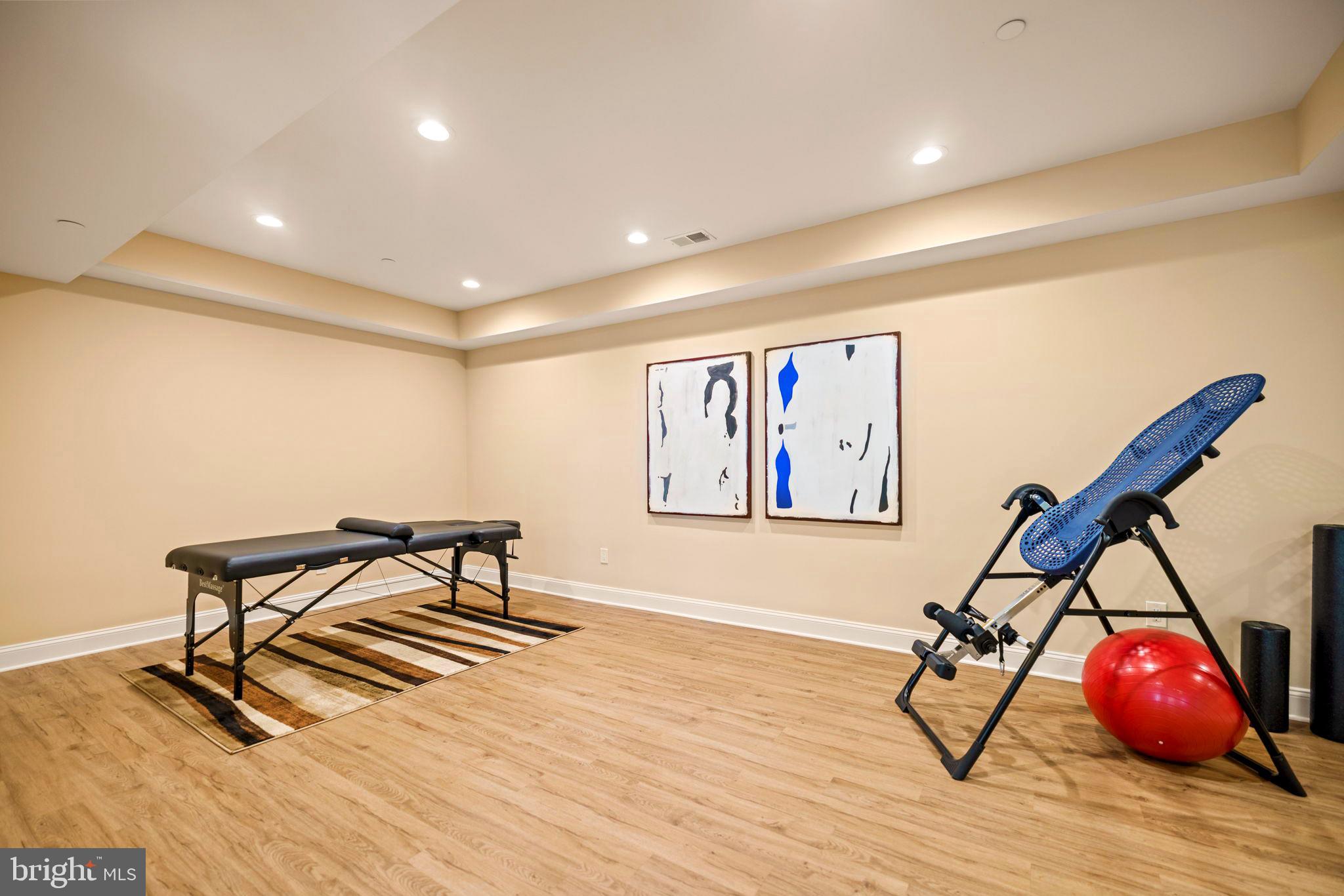 7708 Beech Tree Road Bethesda, MD 20817 - Photo 48 of 55 a view of a room with gym equipment