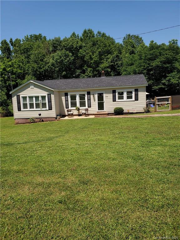 1760 Briggs Road Salisbury, NC 28147 - Photo 2 of 20 a front view of a house with a garden