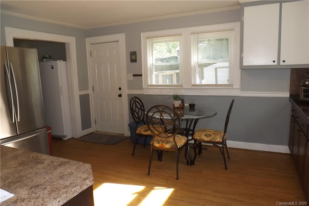 1760 Briggs Road Salisbury, NC 28147 - Photo 15 of 20 a view of a dining room with furniture and a window