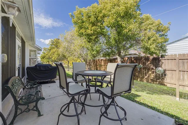 a view of swimming pool with a yard