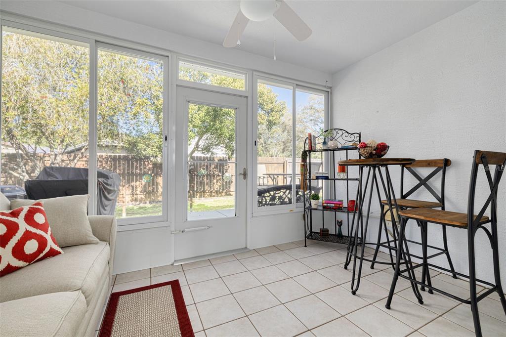 4245 Avanti Circle New Port Richey, FL 34655 - Photo 9 of 28 a living room with furniture and a window