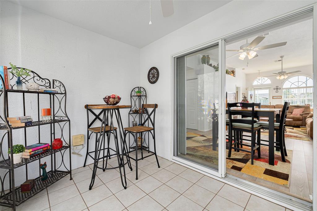 4245 Avanti Circle New Port Richey, FL 34655 - Photo 10 of 28 a view of a dining room with furniture