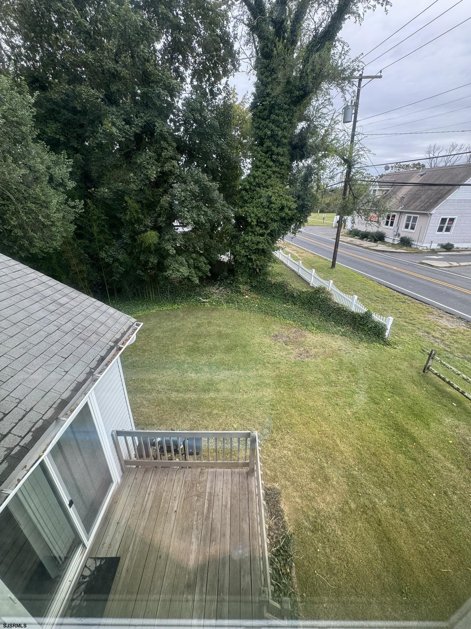 2192 West Avenue, Unit RIGHT SIDE Linwood, NJ 08221 - Photo 22 of 23 a view of a swimming pool with a yard