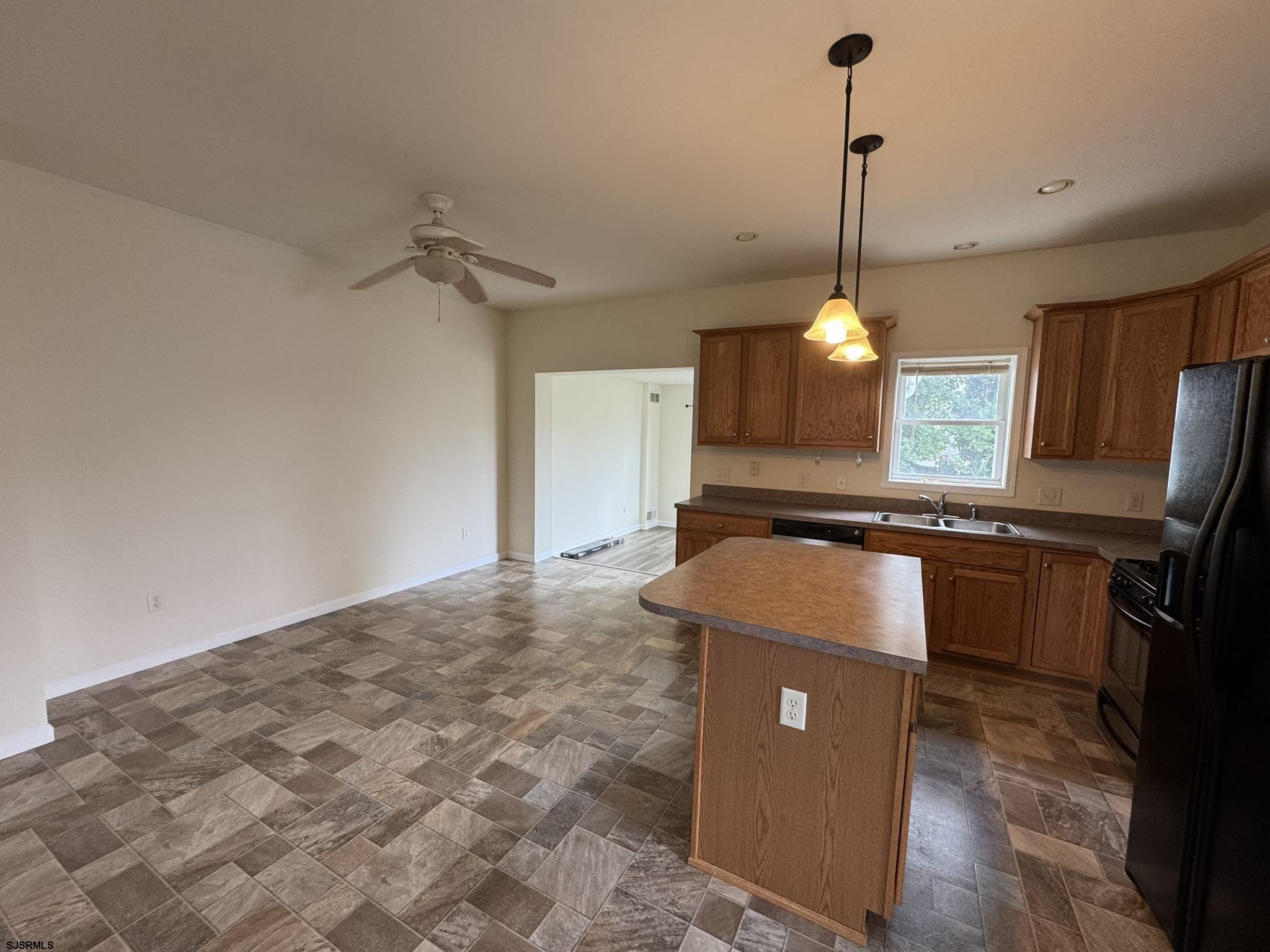 2192 West Avenue, Unit RIGHT SIDE Linwood, NJ 08221 - Photo 3 of 23 a view of a room with windows and wooden floor