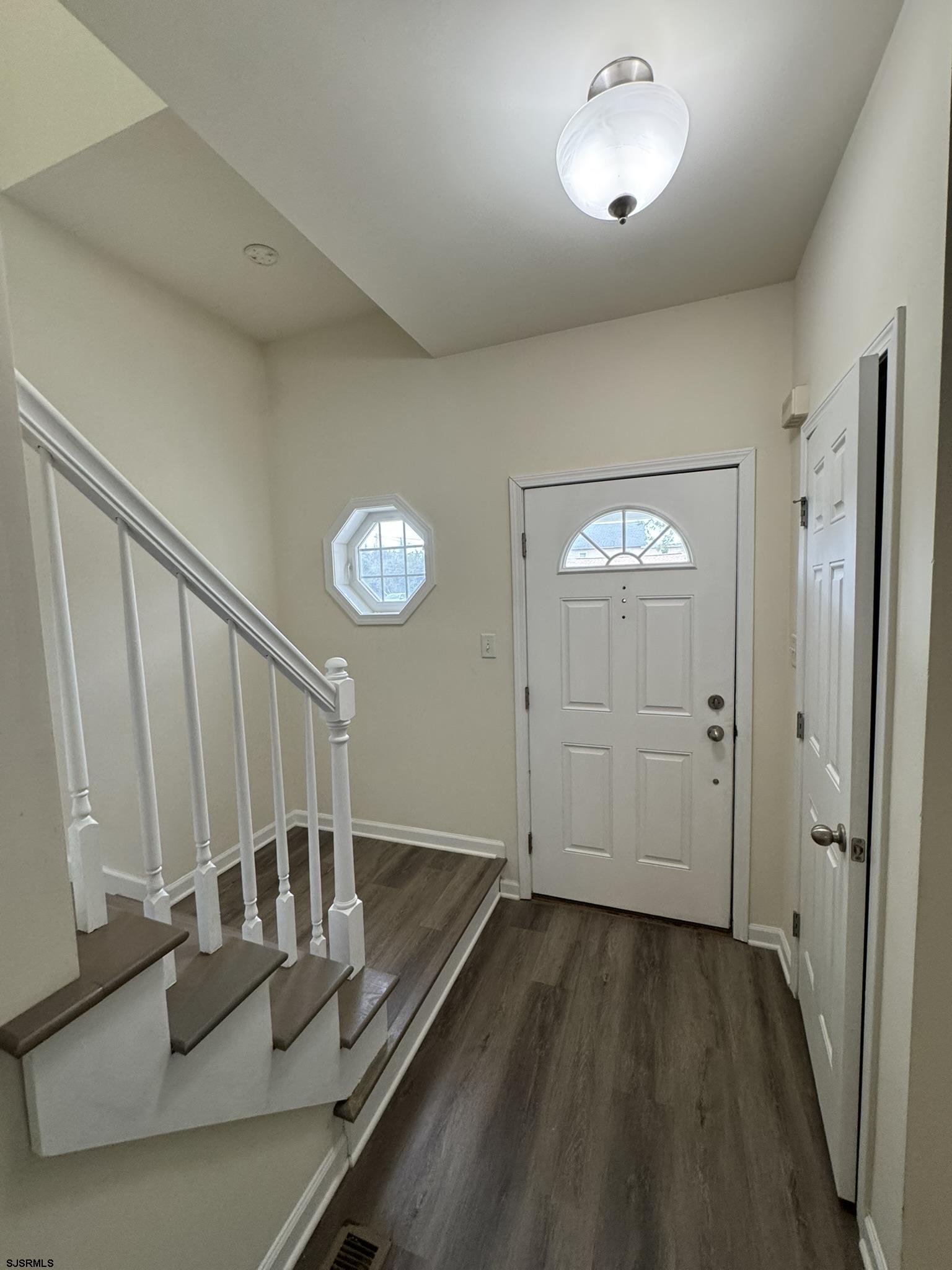 2192 West Avenue, Unit RIGHT SIDE Linwood, NJ 08221 - Photo 10 of 23 a view of a hallway with wooden floor