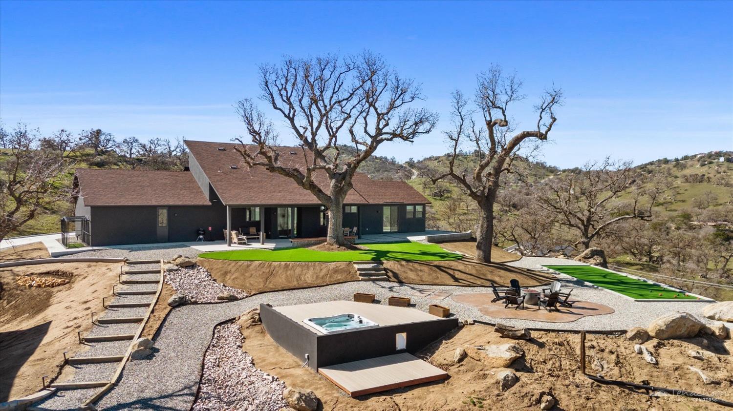 28901 Augusta Way Tehachapi, CA 93561 - Photo 12 of 65 a view of a house with pool and sitting area
