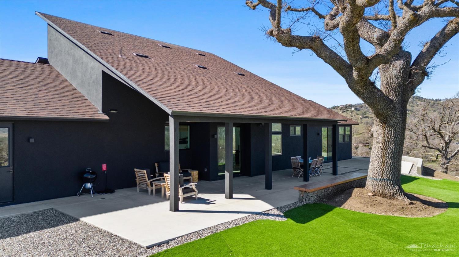 28901 Augusta Way Tehachapi, CA 93561 - Photo 13 of 65 a view of outdoor space yard deck patio and fire pit