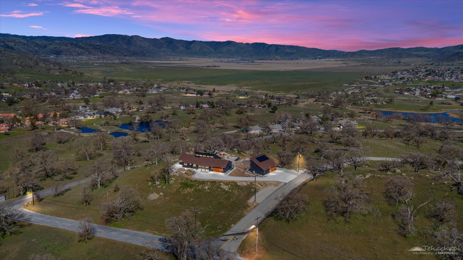 28901 Augusta Way Tehachapi, CA 93561 - Photo 2 of 65 a view of a city with mountains in the background