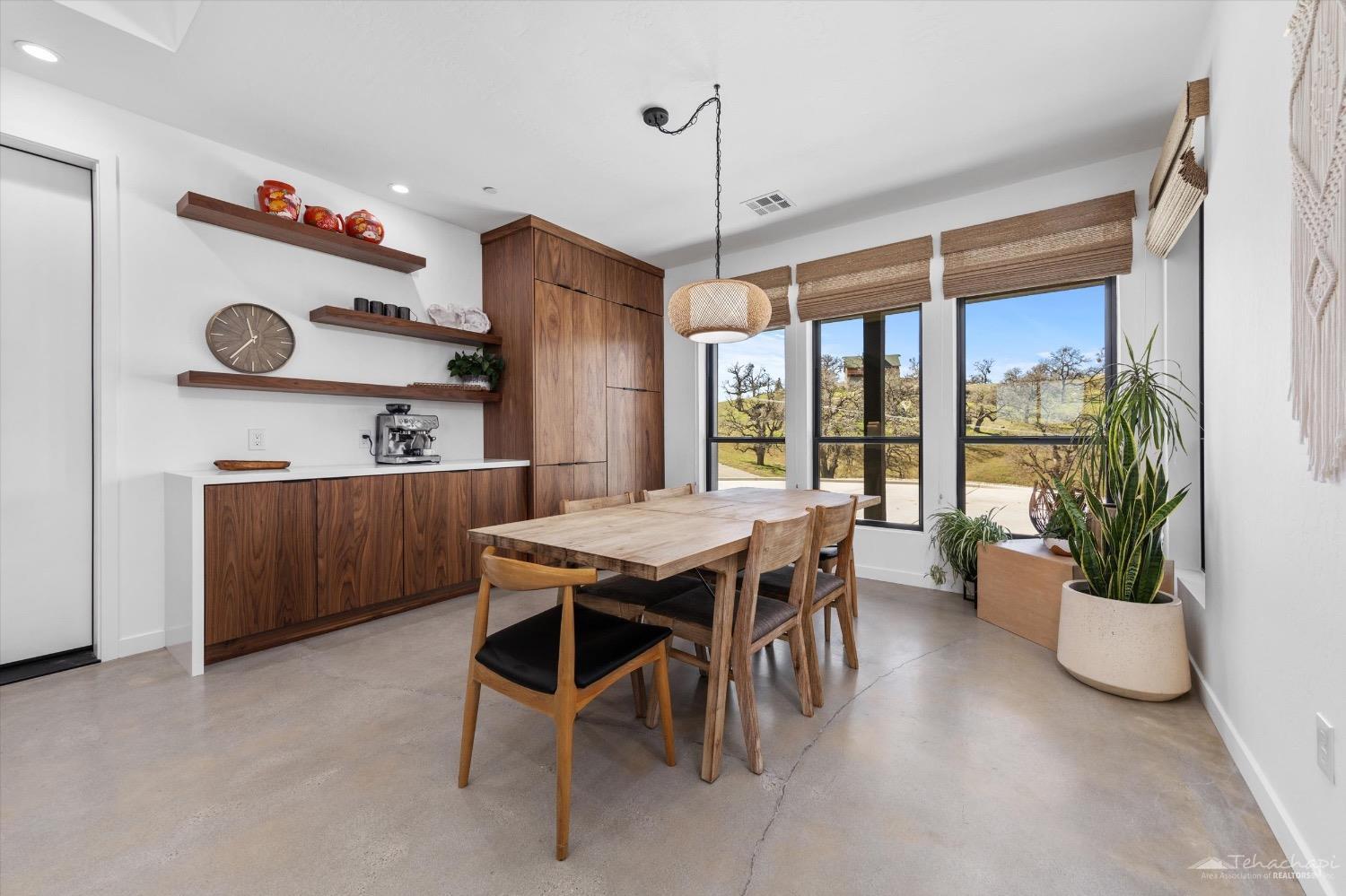 28901 Augusta Way Tehachapi, CA 93561 - Photo 25 of 65 a dining room with furniture and window