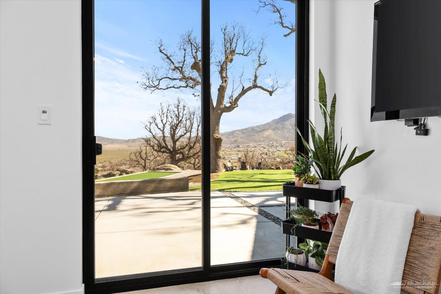 28901 Augusta Way Tehachapi, CA 93561 - Photo 35 of 65 a view of a porch with furniture and a window