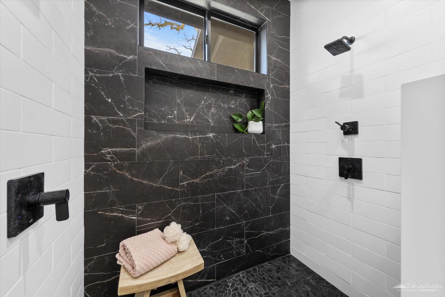 28901 Augusta Way Tehachapi, CA 93561 - Photo 39 of 65 a bathroom with a toilet and a shower