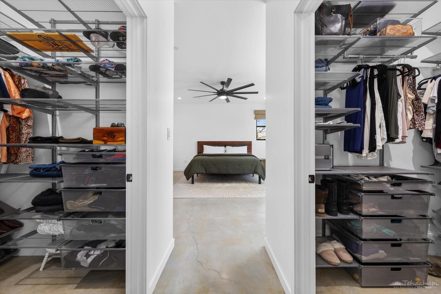 28901 Augusta Way Tehachapi, CA 93561 - Photo 40 of 65 a view of walk in closet with clothes and shoes
