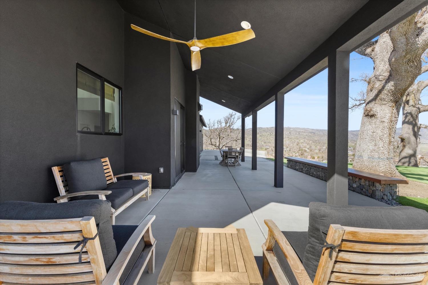 28901 Augusta Way Tehachapi, CA 93561 - Photo 58 of 65 a bed room with a bed and a couch