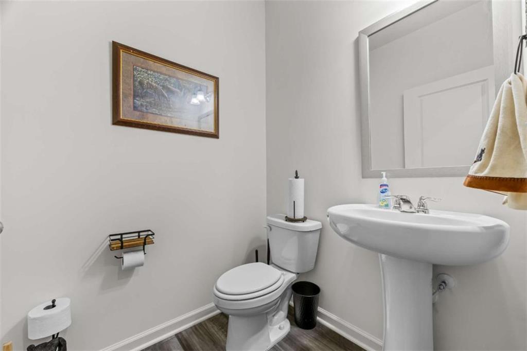 16 Casteel Circle Bethlehem, GA 30620 - Photo 12 of 48 a bathroom with a toilet sink and mirror