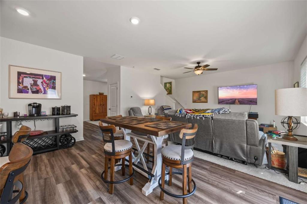 16 Casteel Circle Bethlehem, GA 30620 - Photo 4 of 48 a view of a dining room with furniture and wooden floor