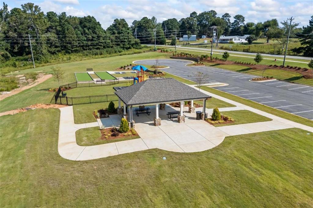 16 Casteel Circle Bethlehem, GA 30620 - Photo 45 of 48 a view of a swimming pool with lounge chairs