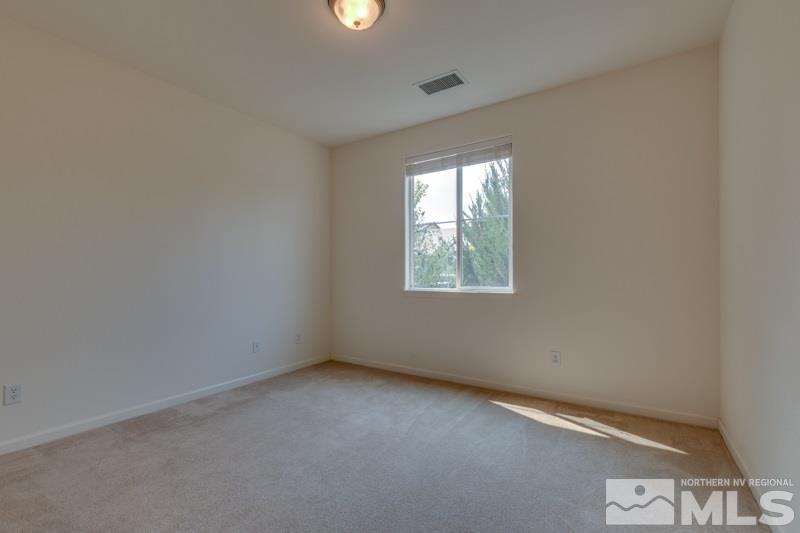 2095 Angel Ridge Drive Reno, NV 89521 - Photo 19 of 30 an empty room with windows