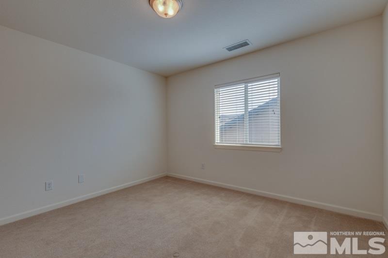 2095 Angel Ridge Drive Reno, NV 89521 - Photo 23 of 30 an empty room with a window