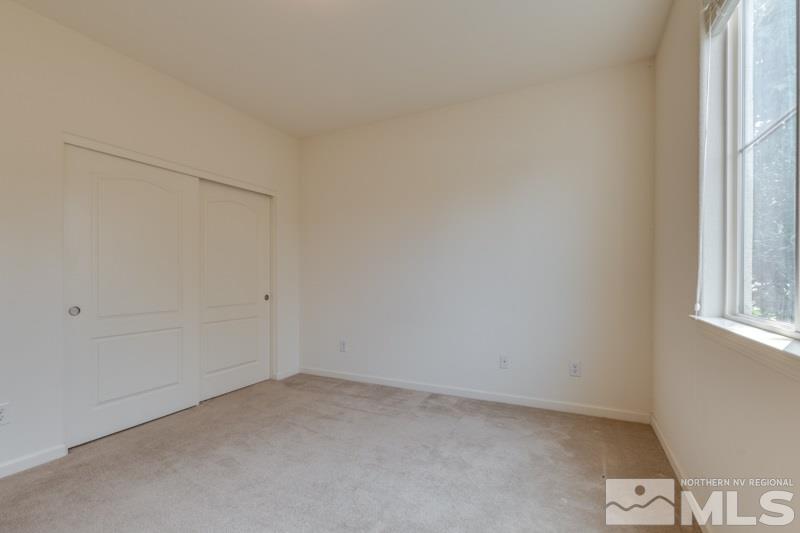 2095 Angel Ridge Drive Reno, NV 89521 - Photo 25 of 30 an empty room with a window