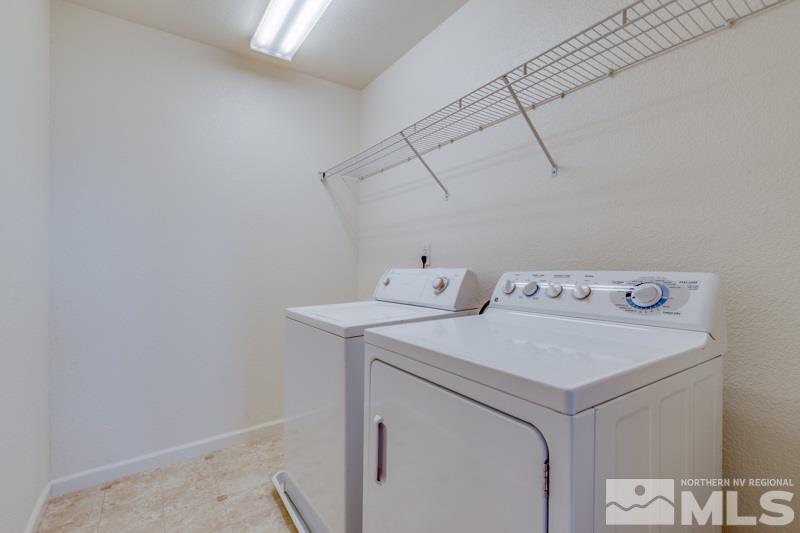 2095 Angel Ridge Drive Reno, NV 89521 - Photo 26 of 30 a utility room with dryer and washer
