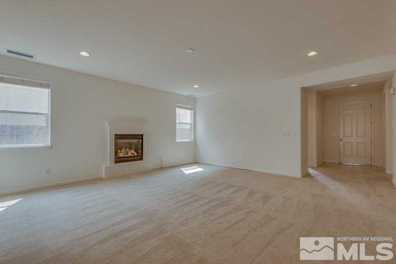 2095 Angel Ridge Drive Reno, NV 89521 - Photo 5 of 30 an empty room with windows and closet