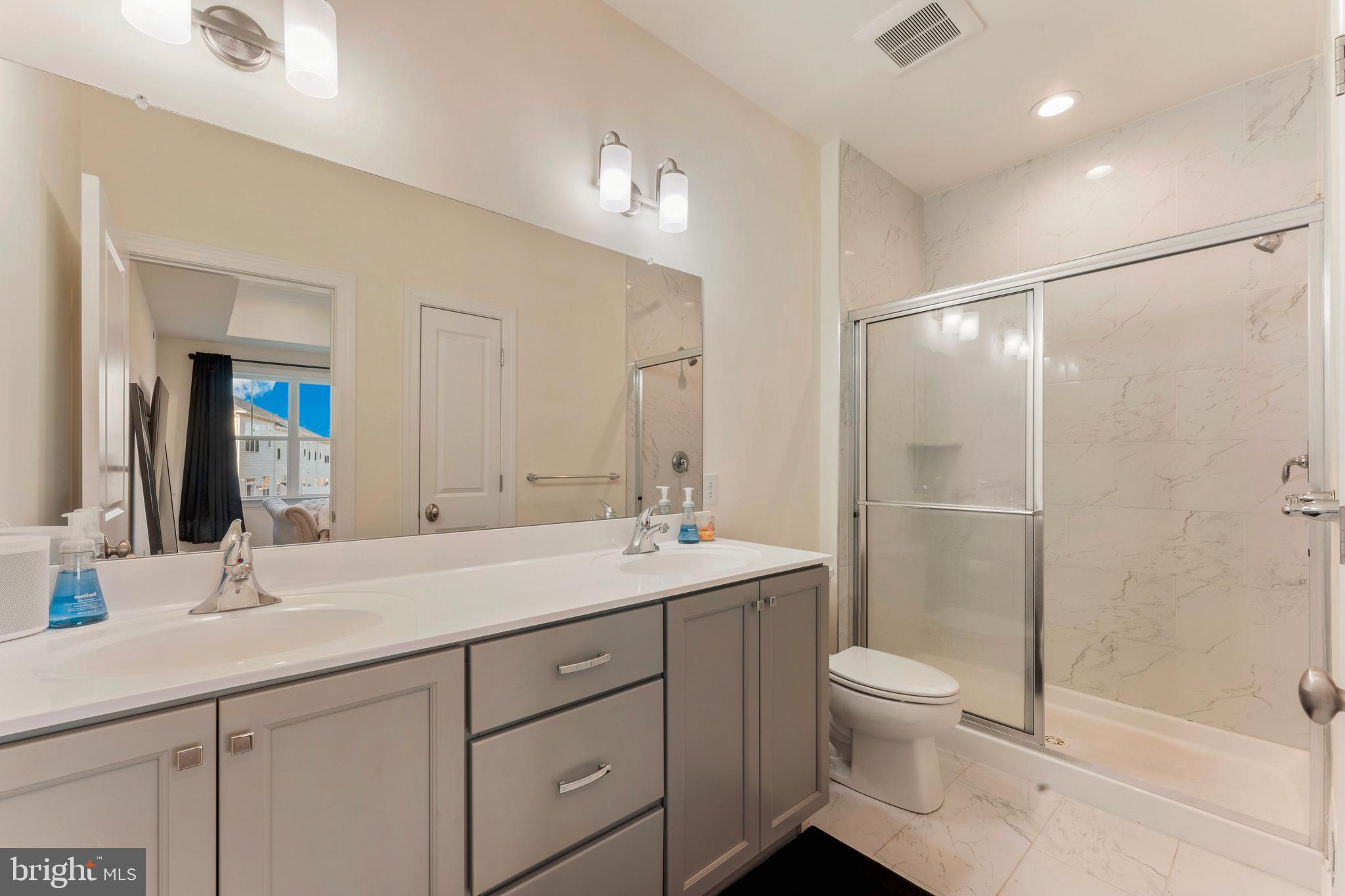 2 Parry Way Warminster, PA 18974 - Photo 18 of 41 a bathroom with a sink a toilet and shower