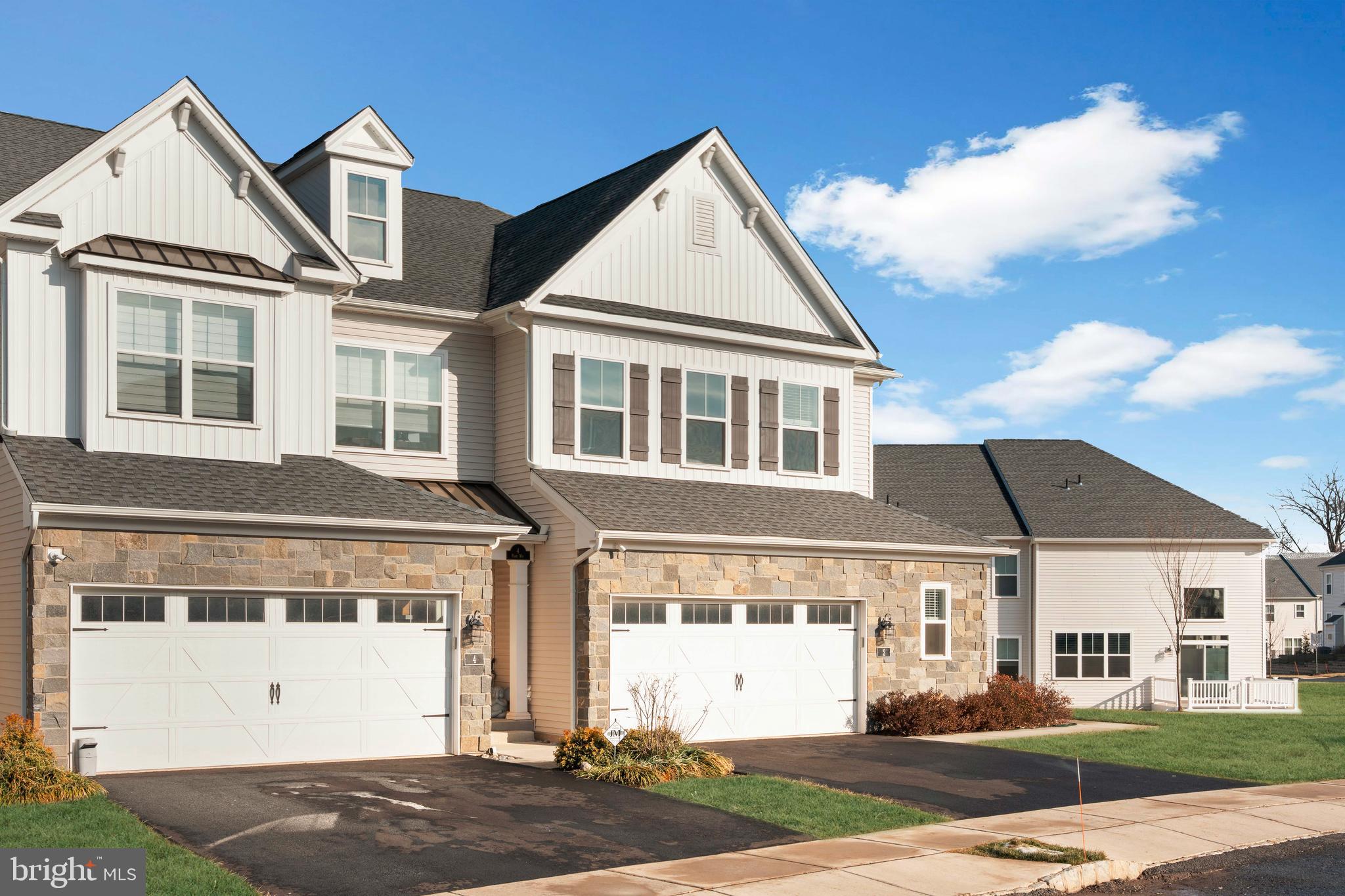2 Parry Way Warminster, PA 18974 - Photo 2 of 41 a view of a white building among the street with palm trees