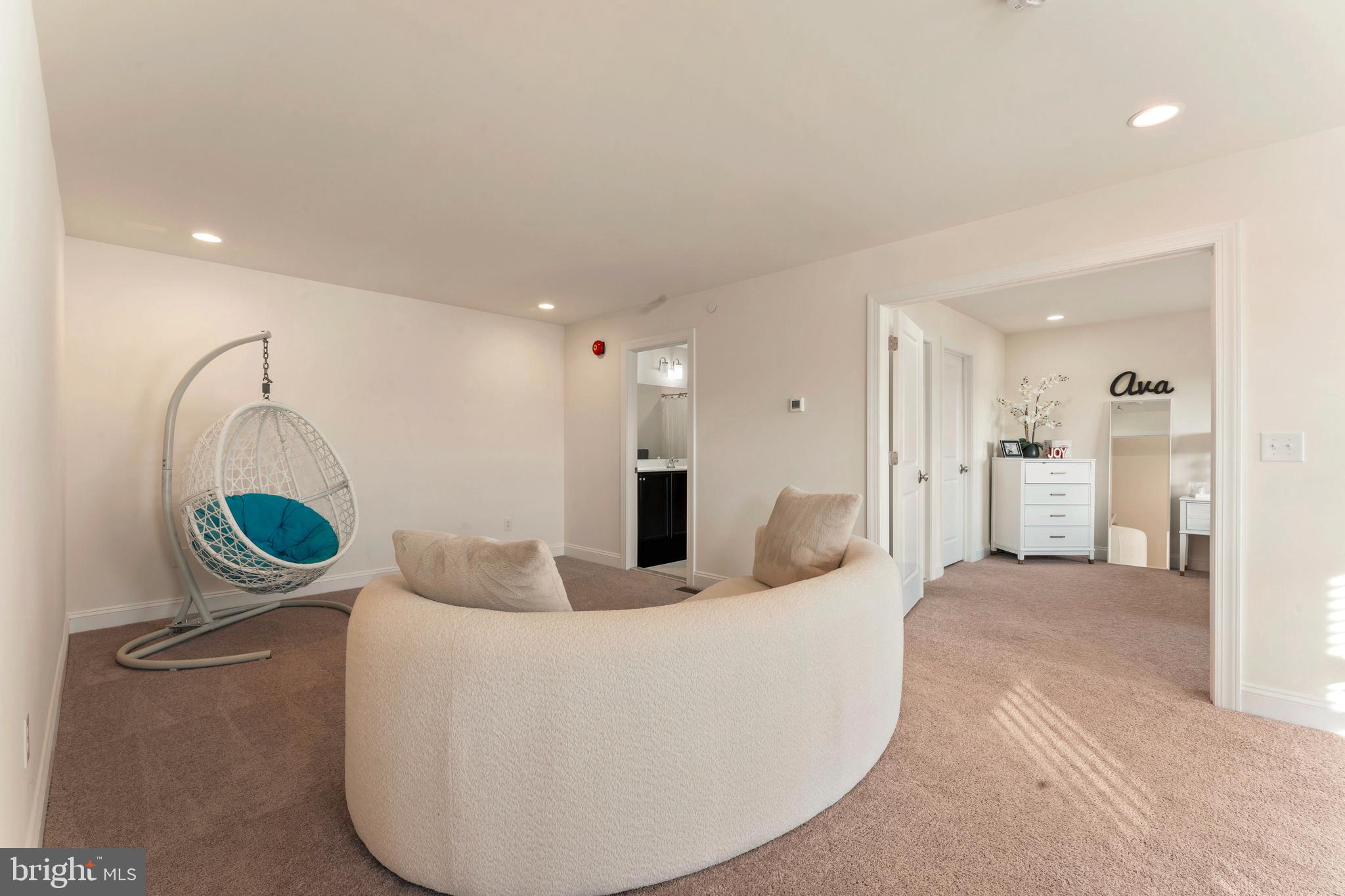 2 Parry Way Warminster, PA 18974 - Photo 22 of 41 a living room with furniture and a chandelier