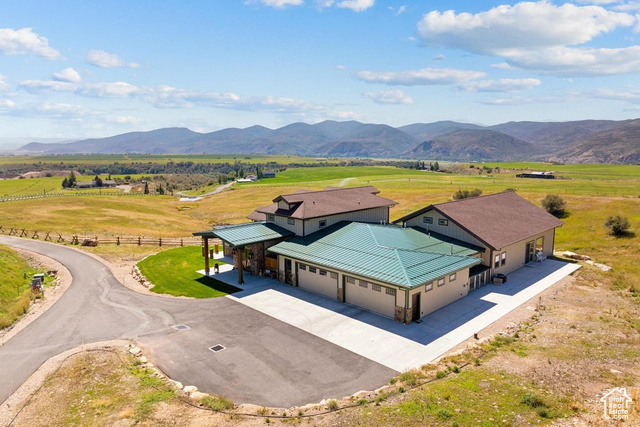 6117 North Rocky Ridge Road Peoa, UT 84061 - Photo 11 of 83 Aerial view featuring a mountain view and a rural view