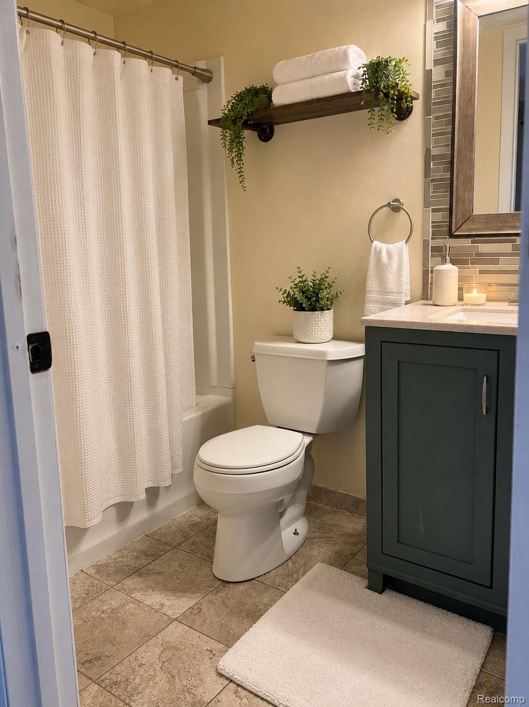 311 West Highland Road, Unit T5 Howell, MI 48843 - Photo 8 of 17 Condo Bathroom Staged 3..jpeg